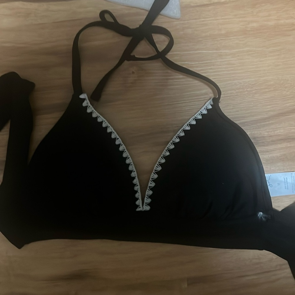 New without tags. Bikini top never worn